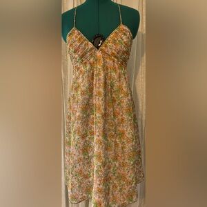 NWOT. Shoshanna dress. Halter top with v-front. Empire waist. Knee length.